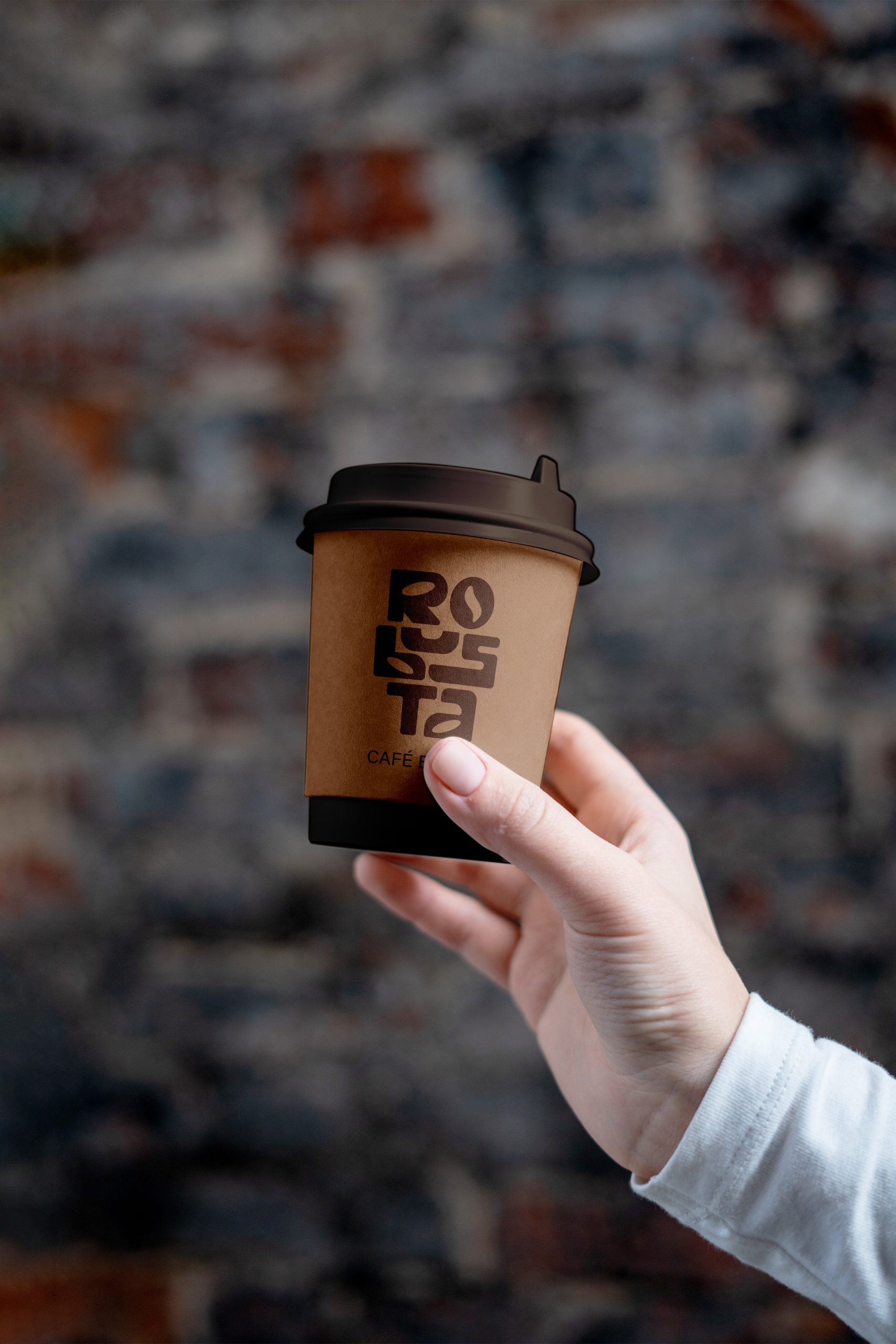 Coffee Cup in Hand Mockup